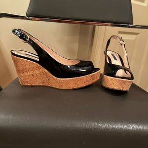 Stuart Weitzman, black Riviera, patent leather wedges
